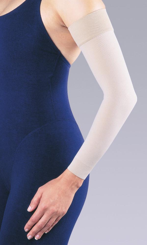 Managing upper limb lymphoedema with use of a combined armsleeve compression  garment.